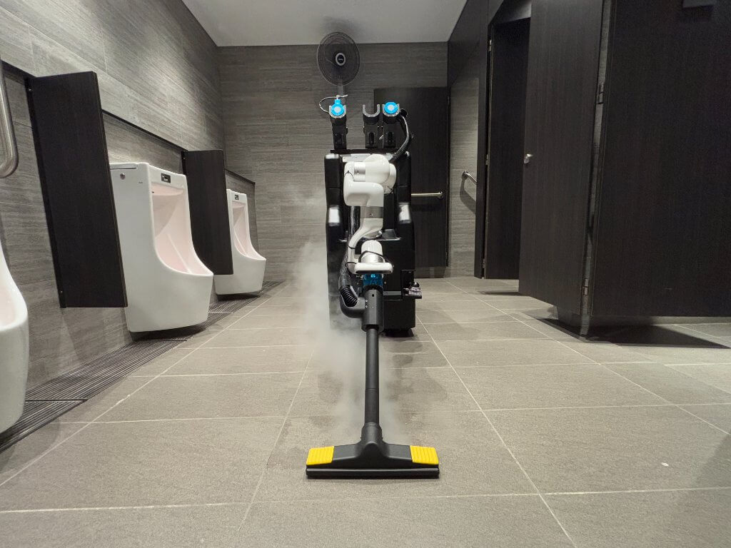 Autonomous robot performing restroom cleaning in a commercial facility